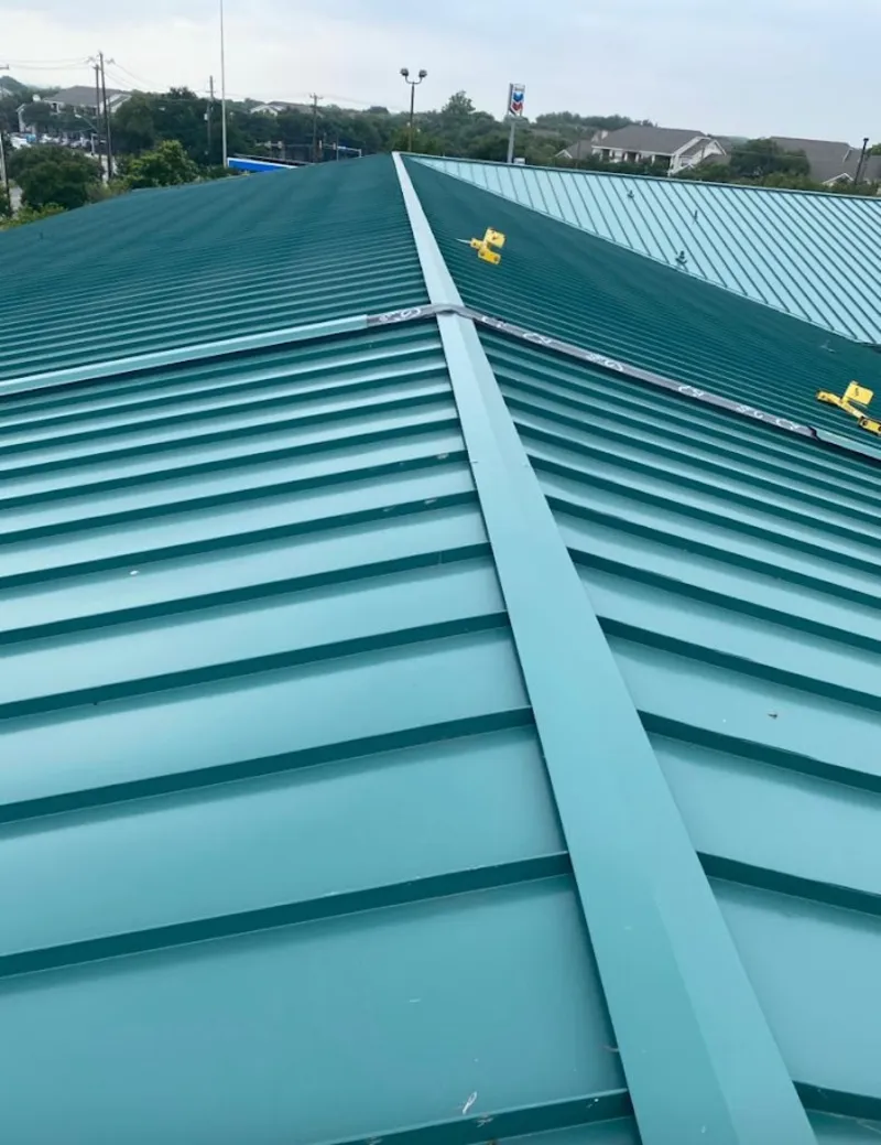 Green commercial metal roof ridge and valley for Metal Roof Repair in North Arlington
