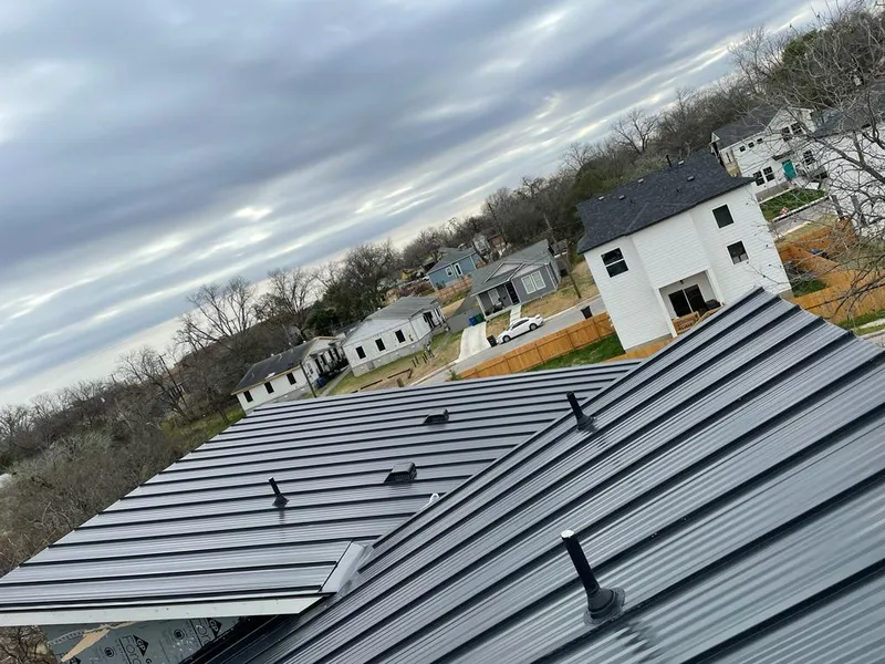 Standing seam metal roof panels with vents for Skylight Repair in North Arlington